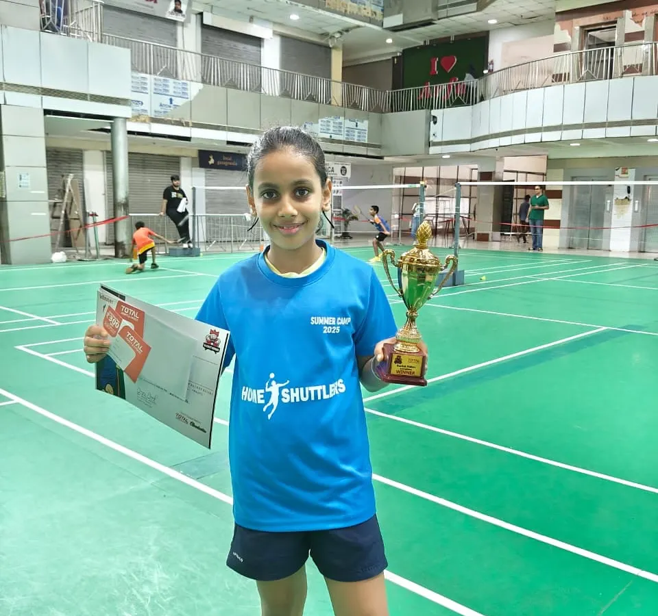 We are incredibly proud of our young champions. Here is one of our U11 winners from the end-of-camp tournament, showcasing the results of dedicated practice and expert coaching.