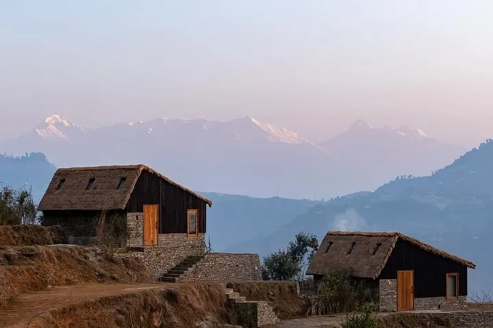 Our guesthouses in Uttarakhand are designed to feel like a natural extension of the Himalayan terrain. We used locally sourced stone and thatch for the roofs, creating simple, elegant structures that sit gently on the land, offering unobstructed views of the Panchachuli peaks.
