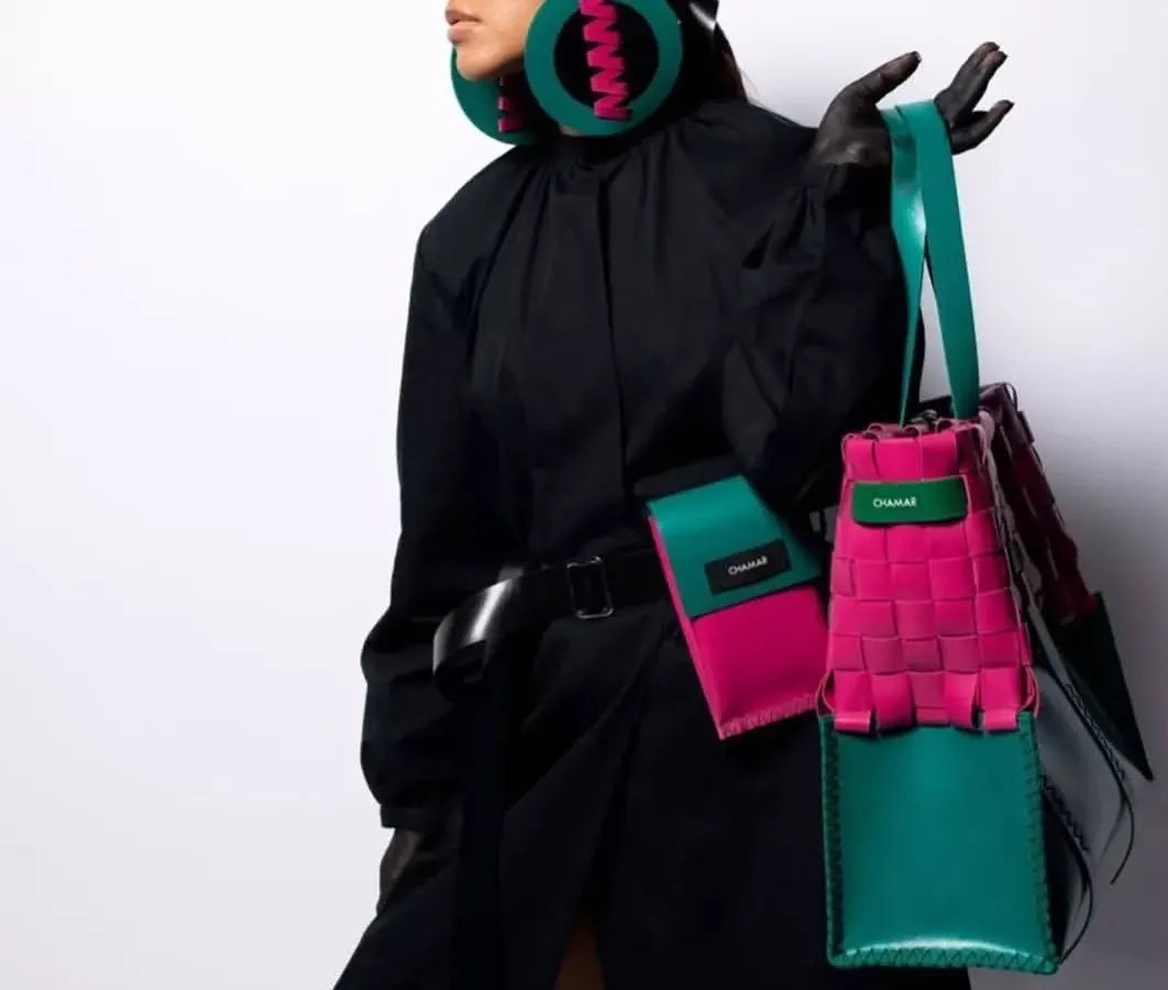 This look from Lakmé Fashion Week for Chamar Studio is all about bold, graphic style. The makeup is clean and sharp, designed to complement the vibrant, structured accessories and make a strong statement on the runway.