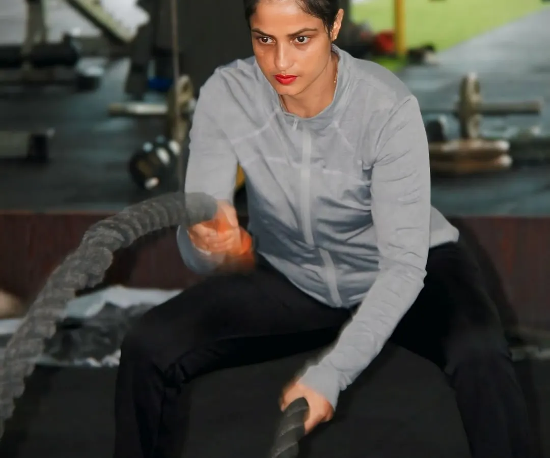 I believe in leading by example. Here I am with the battle ropes, a fantastic tool we use in our functional training sessions for a full-body workout that builds power and endurance.