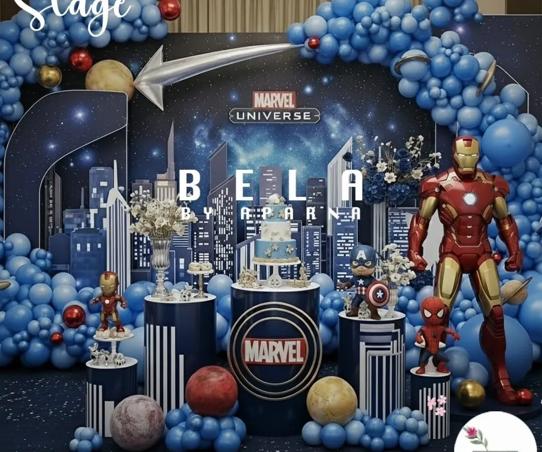 To show my range, I've included this epic Marvel Universe stage setup. It demonstrates how I can switch from soft and whimsical to bold and action-packed, using dynamic lighting, character props, and a cityscape backdrop to create a superhero's dream party.