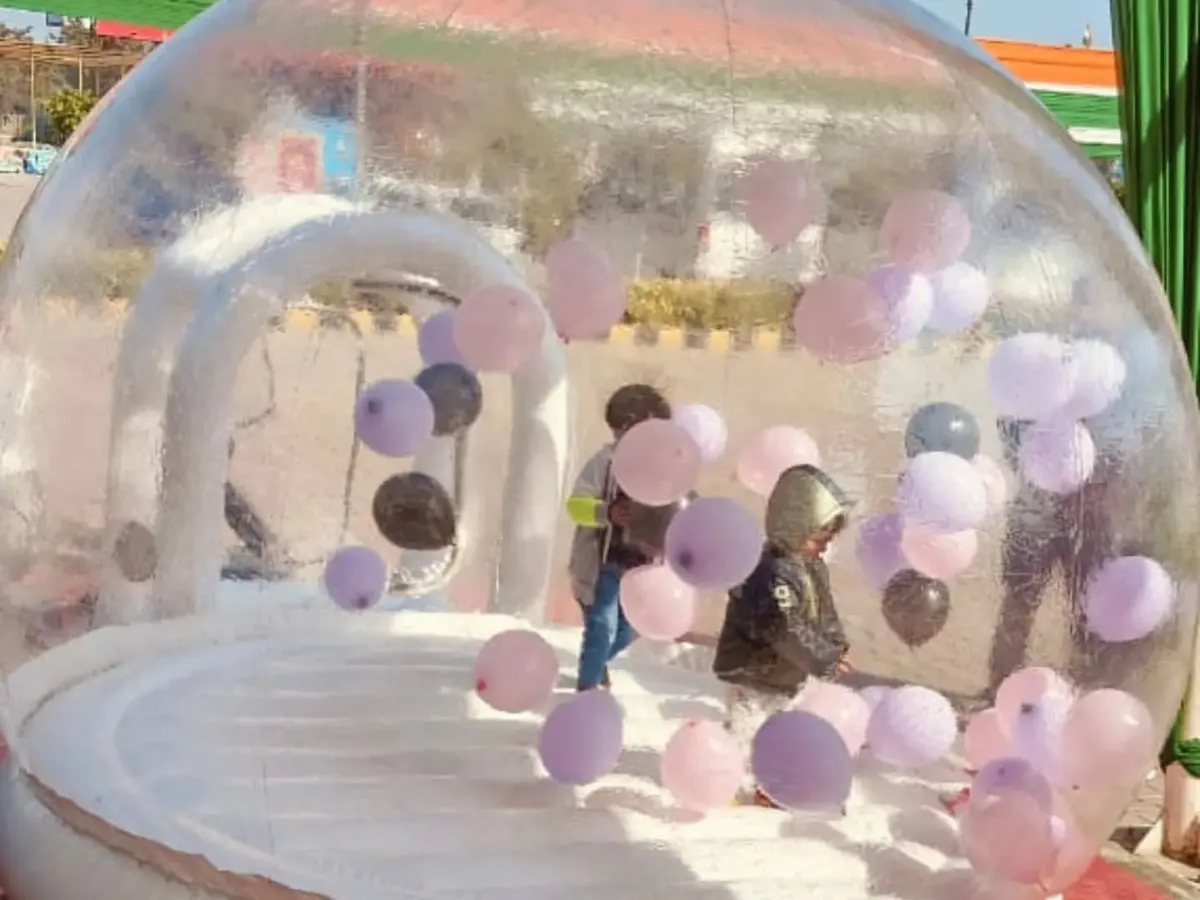 Our transparent bubble house is a huge hit at birthday parties. You can fill it with balloons, as you see here, and it creates a magical play area for kids. It's something different that your guests will definitely remember.