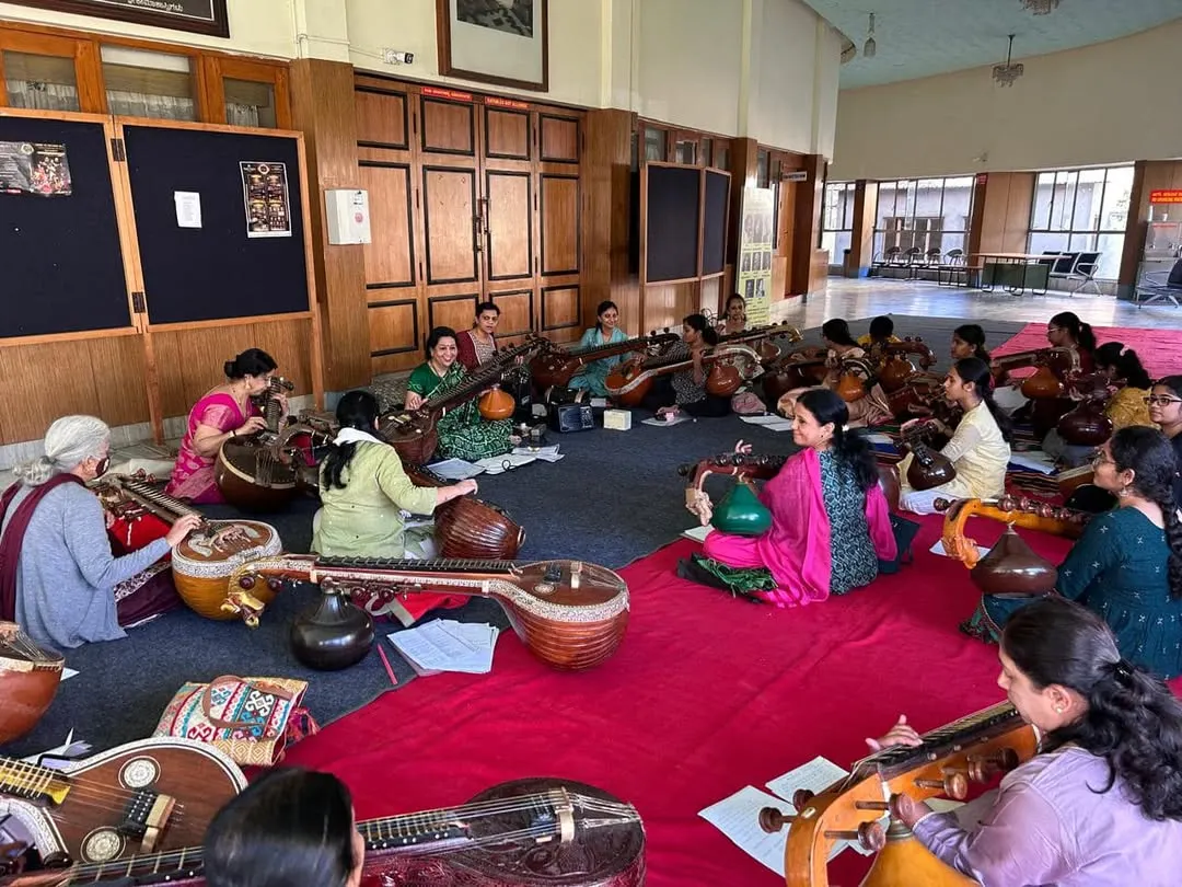 Here we are, deep in preparation for a massive 50-member veena ensemble concert. I lead these interactive workshops where musicians of all levels come together to learn and create something beautiful as a group.
