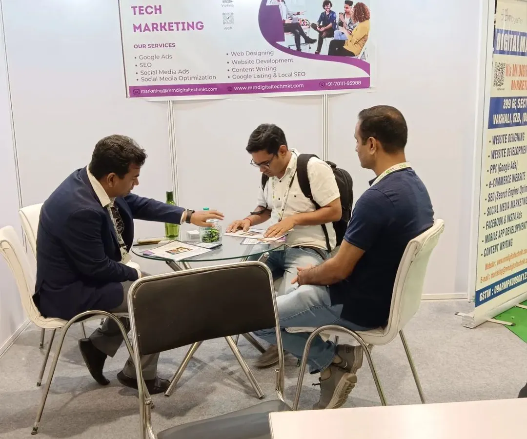 I believe in working directly with my clients. Here I am at a digital marketing event, discussing a business's specific needs and outlining a strategy for their online growth, including SEO and social media ads.
