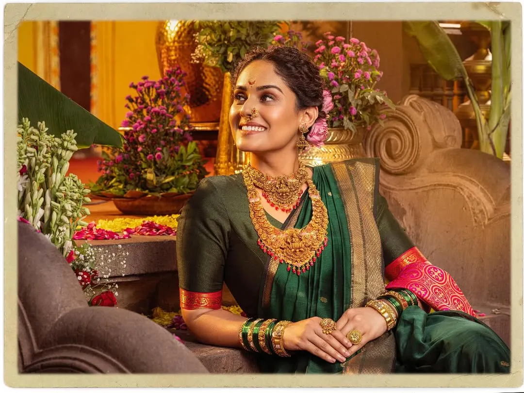 This look for a Ranka Jewellers campaign with Pallavi Patil is one of my favorites. I curated a traditional Maharashtrian bridal style, focusing on a rich green saree and authentic jewellery to create a regal and culturally significant aesthetic.