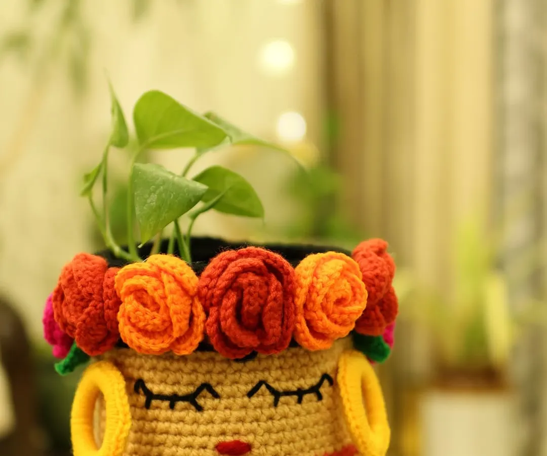 Meet my Frida Basket, a piece that is both bold and beautiful. I designed it to be a piece of art that also organizes your space, featuring an embroidered face and a crown of colourful roses. It’s perfect for holding a plant or keeping your favourite things tidy.