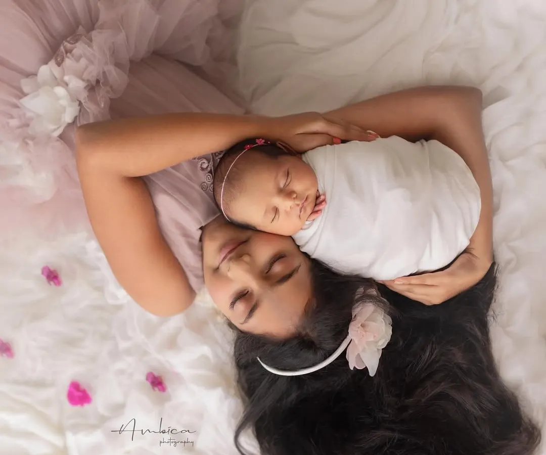 An artistic overhead portrait capturing the tender bond between two sisters. I see these moments as poetry, freezing the quiet, beautiful connection that they will share for a lifetime.