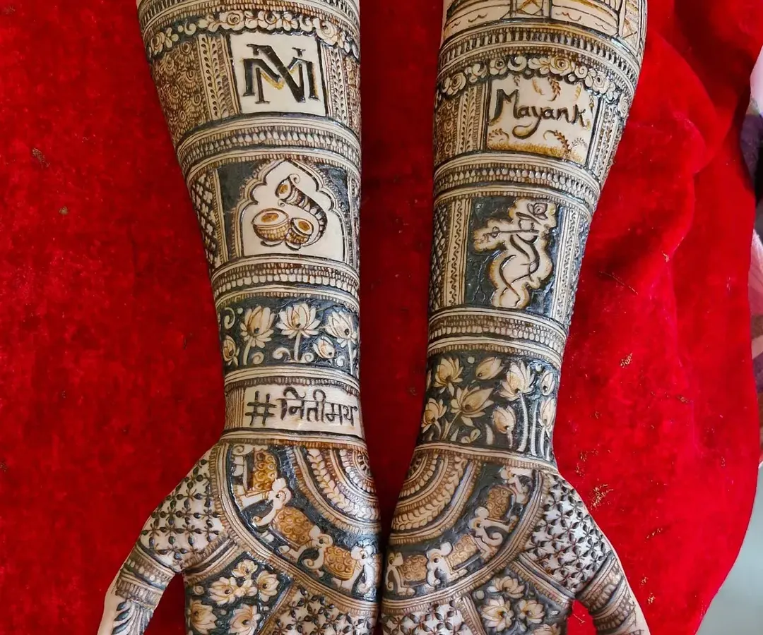 For the modern Mumbai bride, I designed this unique skyline mehendi. It features the iconic Gateway of India and the Bandra-Worli Sea Link, along with the couple's initials and wedding hashtag.