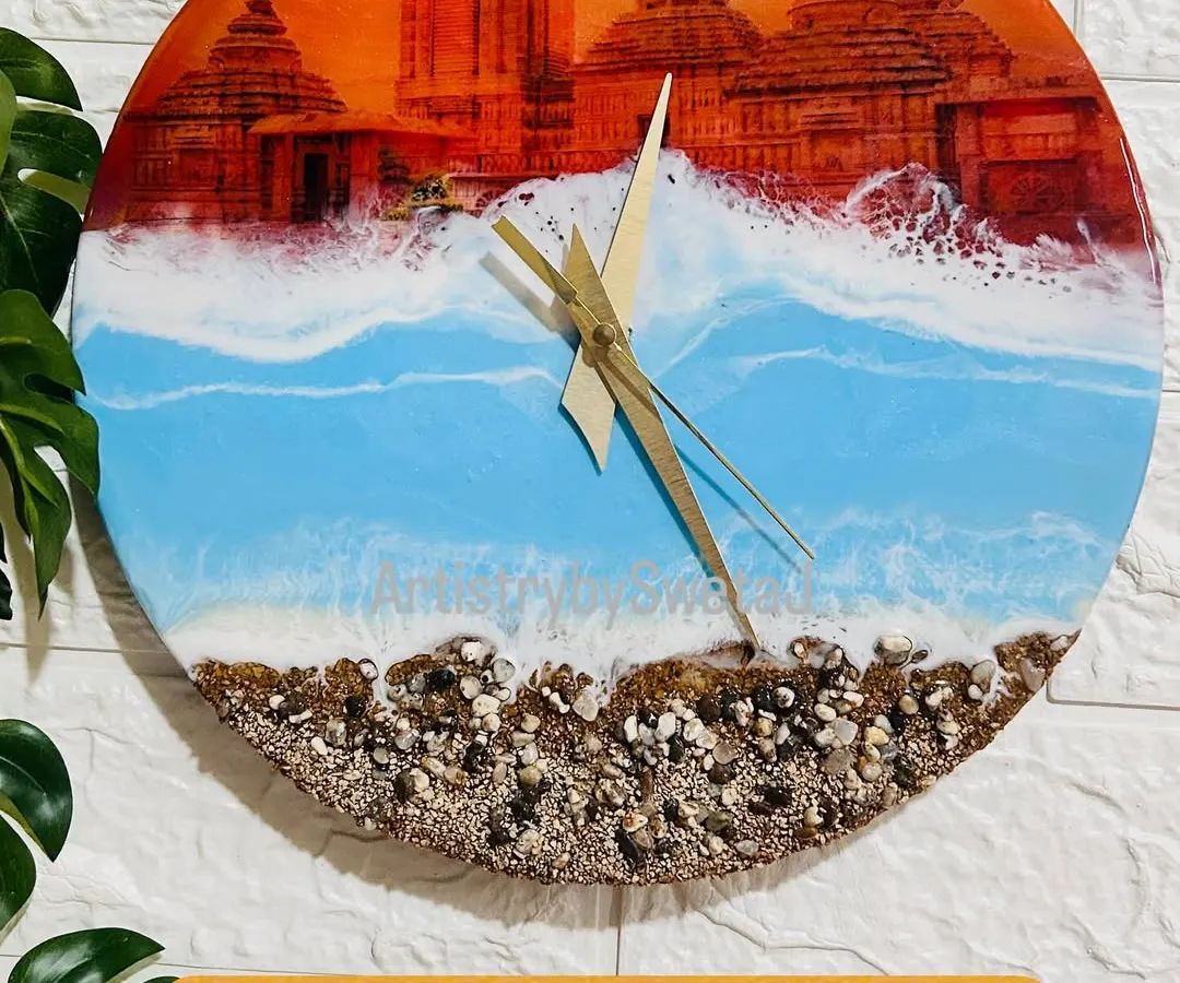 I crafted this special Jagannath Puri wall clock to capture the meeting of divine faith and the endless ocean. The design features the sacred temple against a sunset sky, with real sand and textured waves, bringing a piece of Puri's spiritual energy into your home.