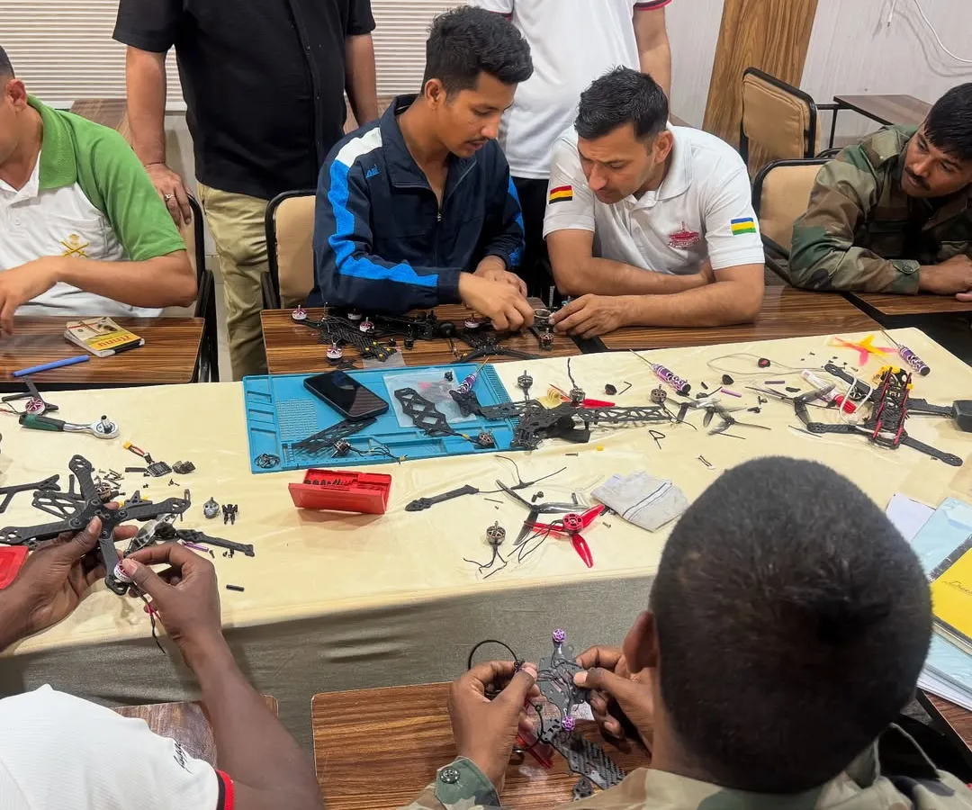 My training is all about getting your hands dirty. Here, you can see soldiers in my workshop, deeply focused on assembling their FPV drones piece by piece, learning the mechanics and electronics firsthand.