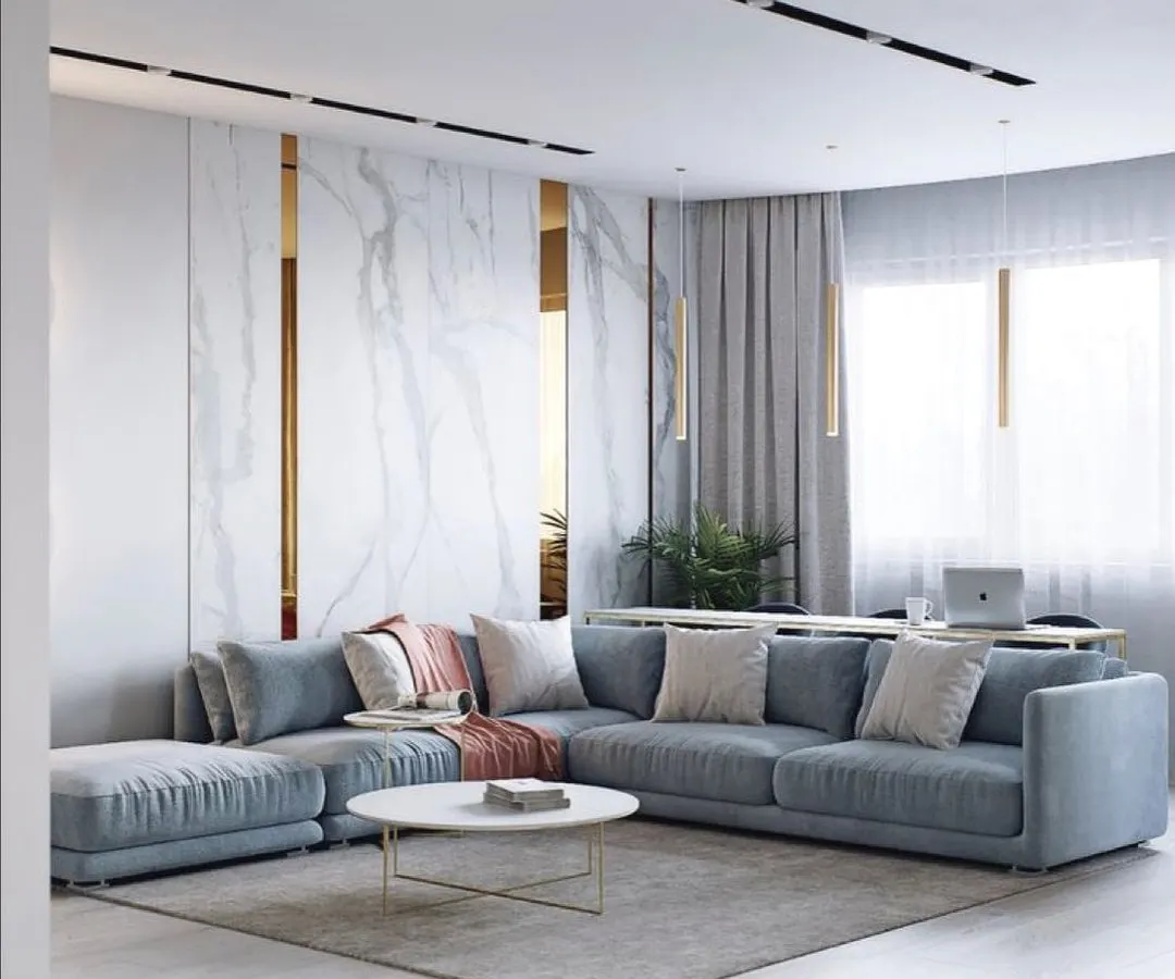 I designed this living room space to feel both luxurious and inviting. The centerpiece is a custom L-shaped sectional sofa in a soft, durable fabric, perfect for family gatherings. The clean lines of the sofa are balanced by plush cushions, creating a modern yet comfortable atmosphere that can be adapted to any contemporary home.