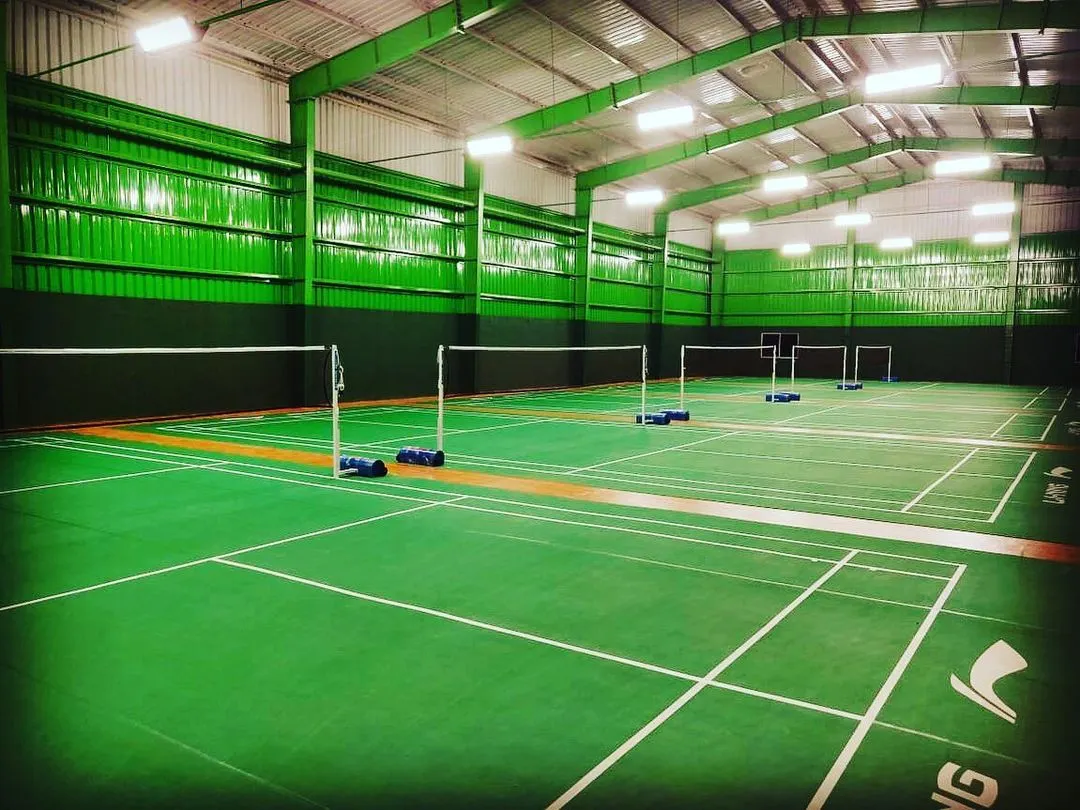 A clear view of our BWF-approved Li-Ning synthetic courts, ready for action. We ensure our courts are always clean and well-maintained for the best playing experience.