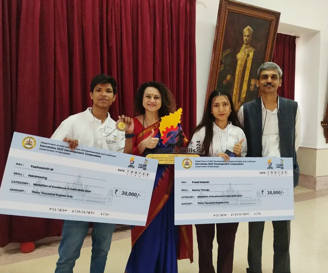 We are proud to be the official training partner for Skills India. This image captures our students being felicitated by the Government of Karnataka for their national-level achievements, a testament to the high standard of our training.