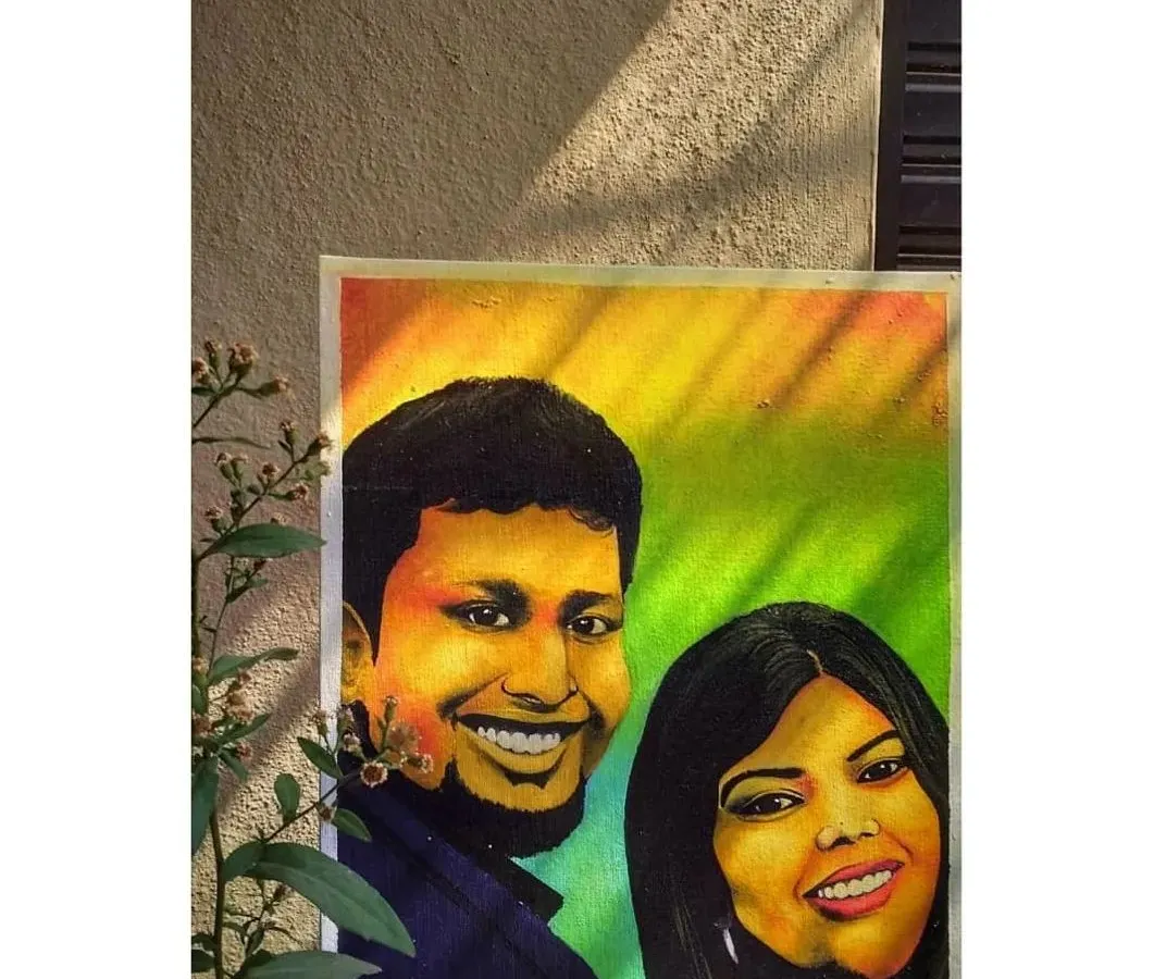 A custom couple's portrait painted on canvas, capturing a moment of shared joy. My goal with portraits is to go beyond a simple likeness and paint the unique connection and personality of the people involved. This expressive style uses vibrant colors to bring the subjects to life.