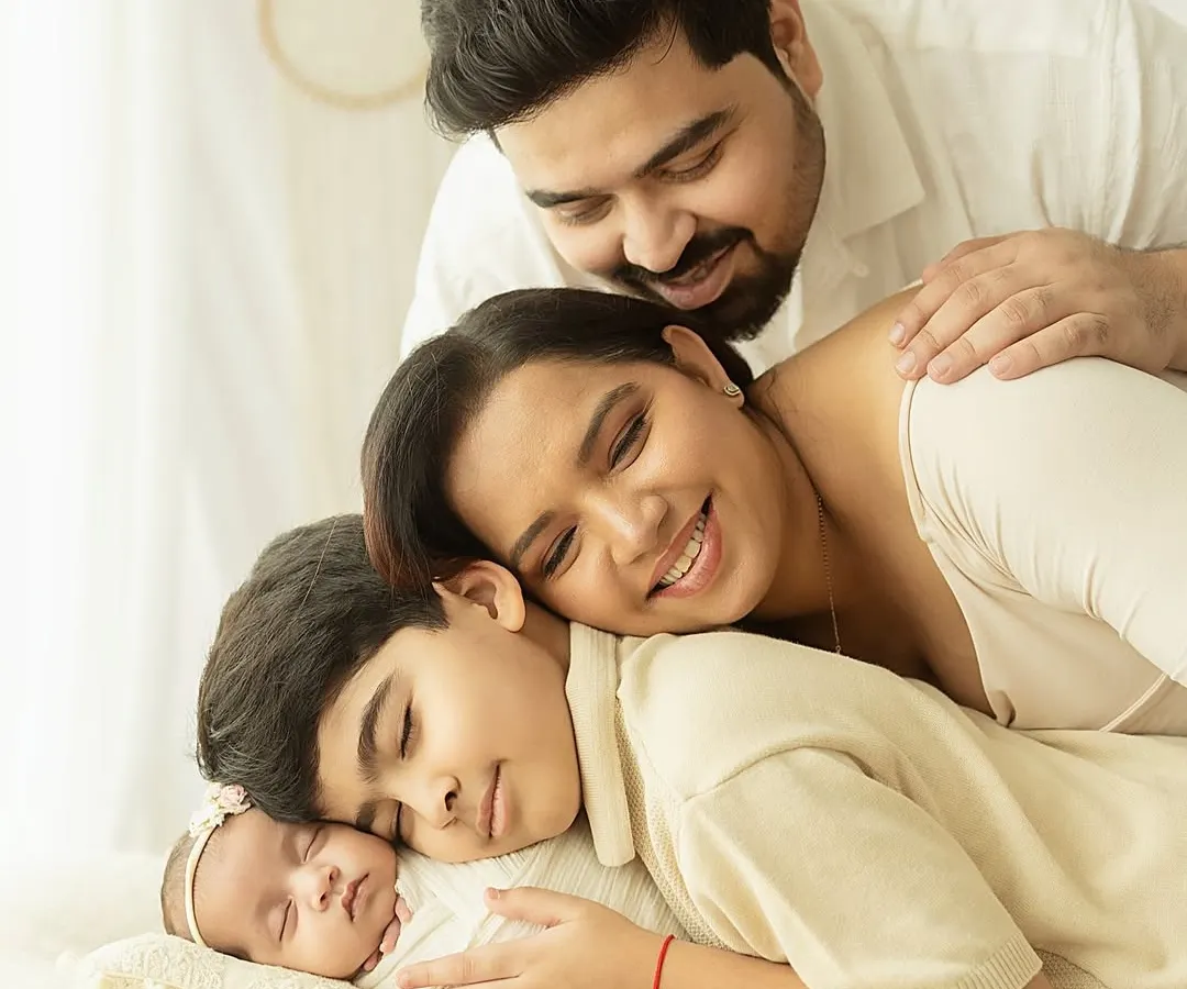 This is what love looks like. A family complete, wrapped in a moment of pure, quiet connection. I focus on capturing these real, unposed feelings that you will cherish for a lifetime.