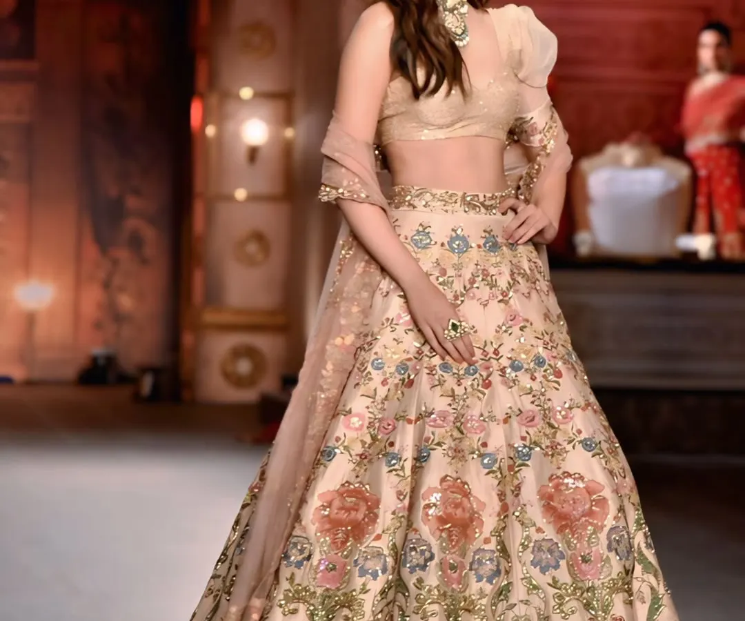 On the runway, every detail matters. Here, I captured actress Kriti Sanon in a full-length shot, showcasing the intricate embroidery and graceful flow of her stunning lehenga.