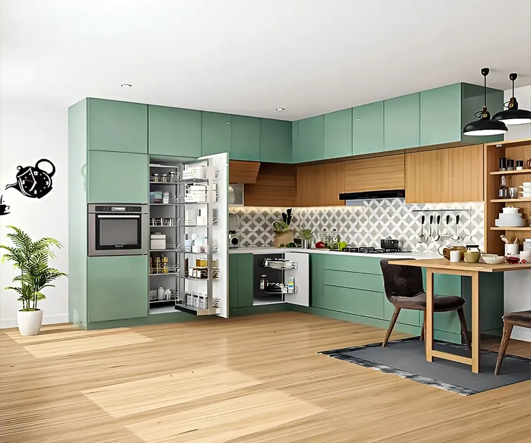 This L-shaped modular kitchen combines sage green cabinetry with natural wood tones for a fresh, contemporary feel. We focused on maximizing utility with a full-height pull-out pantry and a magic corner unit, ensuring every inch is usable. The design also incorporates a cozy dining nook, making the kitchen a perfect space for both cooking and socializing.
