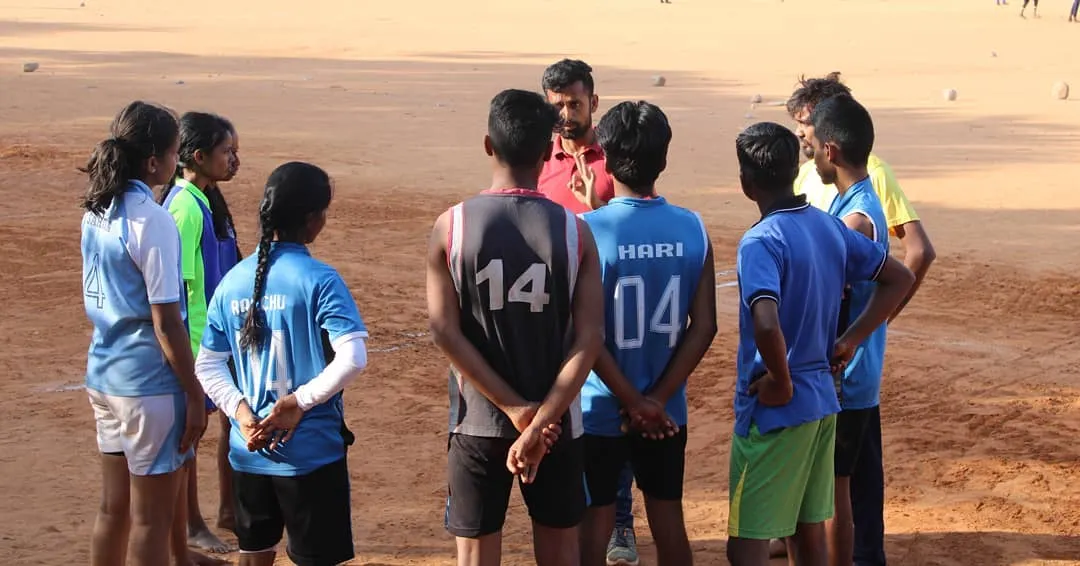 Training is more than just drills; it's about strategy and communication. Here, we're in a huddle discussing tactics for Kho-Kho. We believe in building smart players who work together as one team, one family.