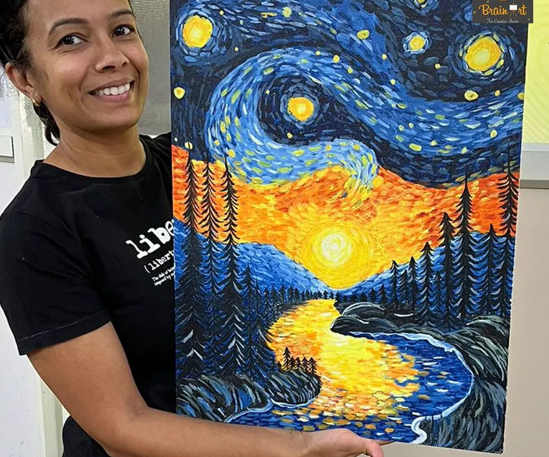 A student proudly displays her vibrant recreation of Van Gogh's 'Starry Night'. Our acrylic painting classes help you explore famous art movements and develop your own style, turning a blank canvas into a personal masterpiece.