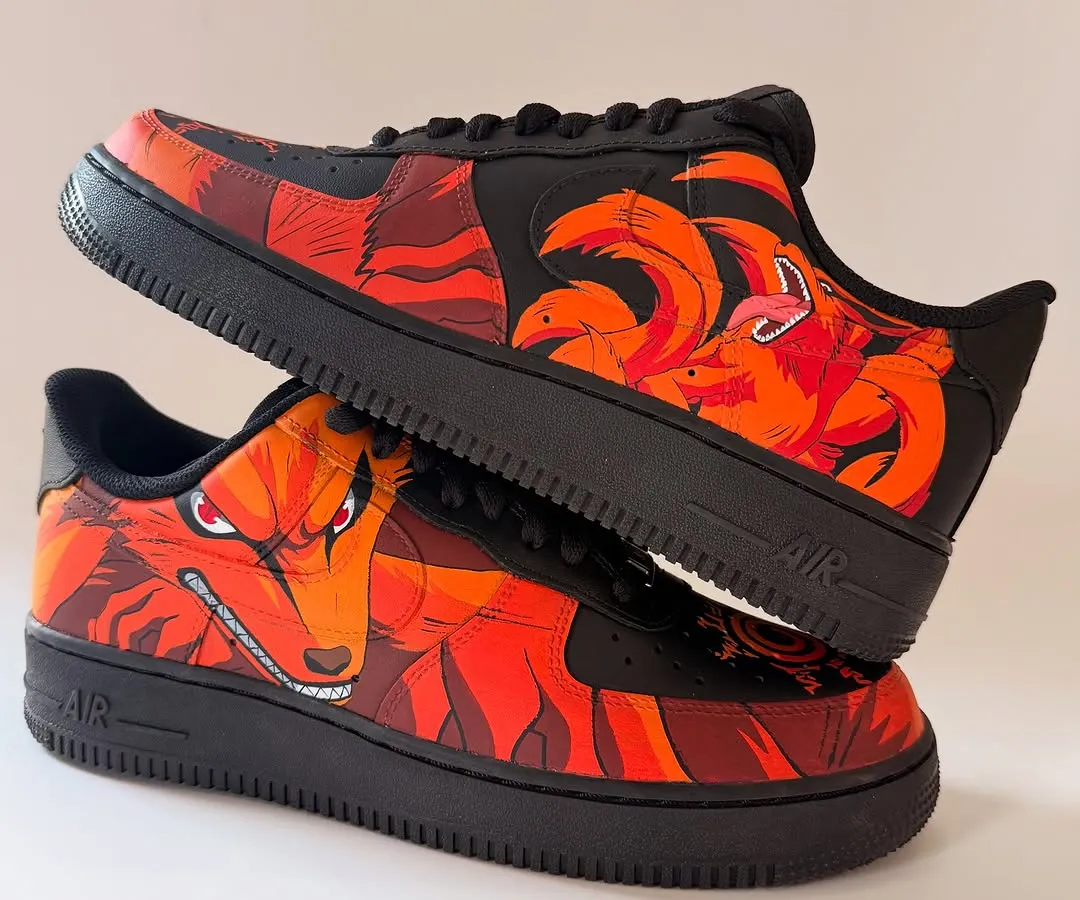 For all the anime lovers, this one was a beast to create. I transformed these all-black Nike Air Force 1s with a depiction of Kurama in his full Nine-Tails form. The fiery oranges and reds pop against the black, capturing the raw energy of the character. This is a perfect example of how I bring powerful anime art to life on footwear.