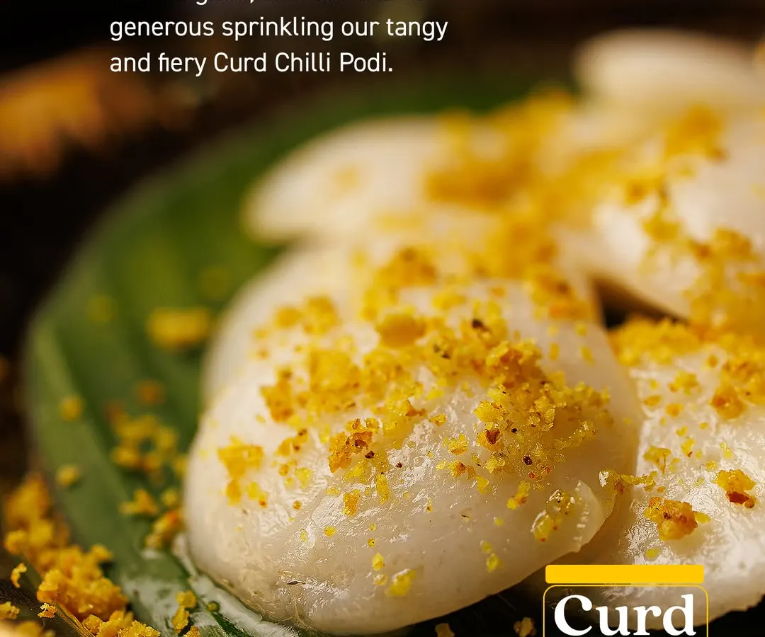 Look at these fluffy mini idlis, generously drizzled with molten ghee and sprinkled with my tangy and fiery Curd Chilli Podi. This is how I love to enjoy them, a simple dish transformed into a flavourful experience.