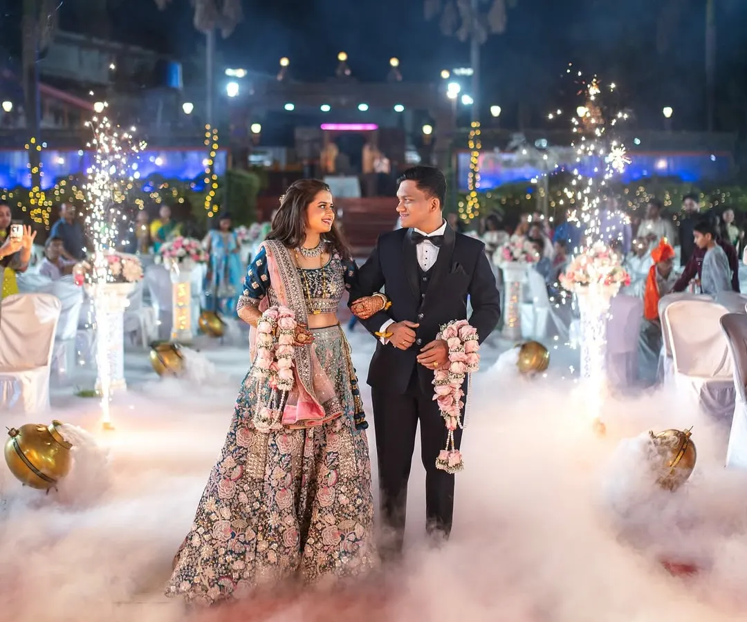 Making a grand entrance at the reception. I use special effects like low-lying fog and sparklers to create a dramatic, cinematic feel for your reception photography, ensuring your entry is as memorable as the ceremony itself.