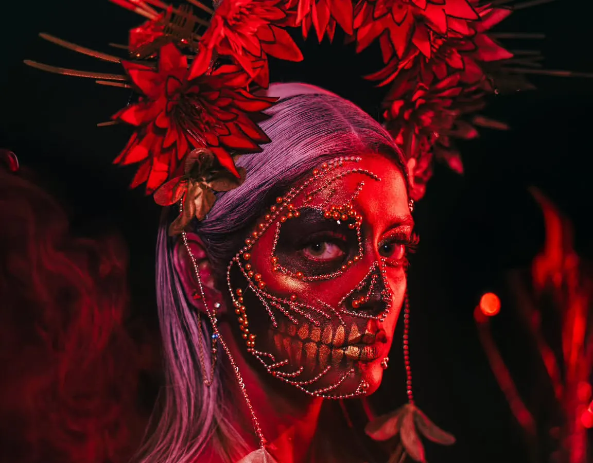 Unleash your creativity with our fantasy makeup module. This striking red skull look, created by our students, shows the level of detailed artistry and character design you will learn to master for portfolio shoots and creative projects.