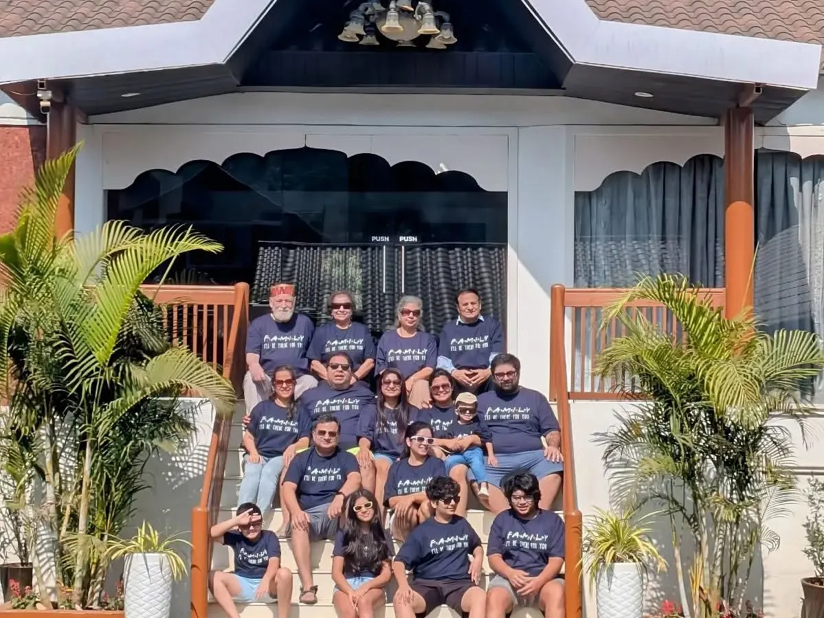 Getting the whole family together for a vacation or reunion? I create matching custom t-shirts for large groups to make your event even more memorable. This family is rocking their personalized navy blue tees by the pool.