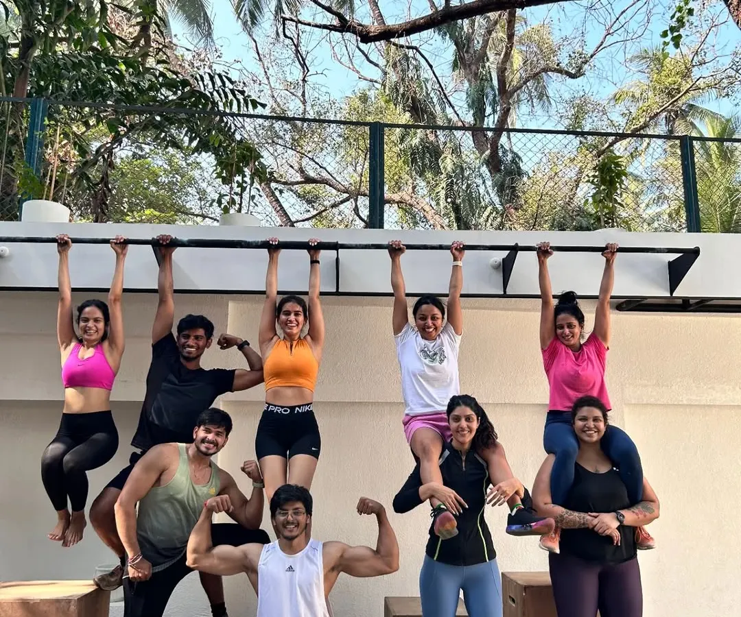 This picture says it all. We’re a community that gets strong, has fun, and supports each other, literally. This is the energy you can expect when you become one of the #PeopleOfTheSpace.