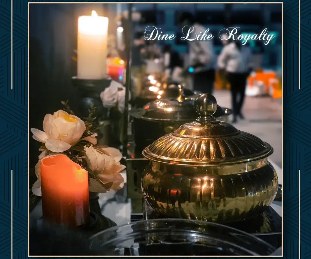 I believe in dining like royalty, and my signature golden serveware embodies that philosophy. This piece, glowing under candlelight, is not just a vessel for food; it's a statement of luxury and a core part of the regal ambiance I bring to your celebration.