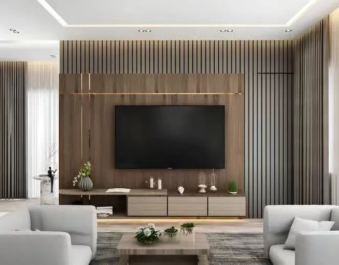 This expansive entertainment wall combines a sleek, low-profile console with a textured backdrop of vertical wooden slats. The design creates a sense of width and luxury, perfectly framing the television in a contemporary open-plan living room.
