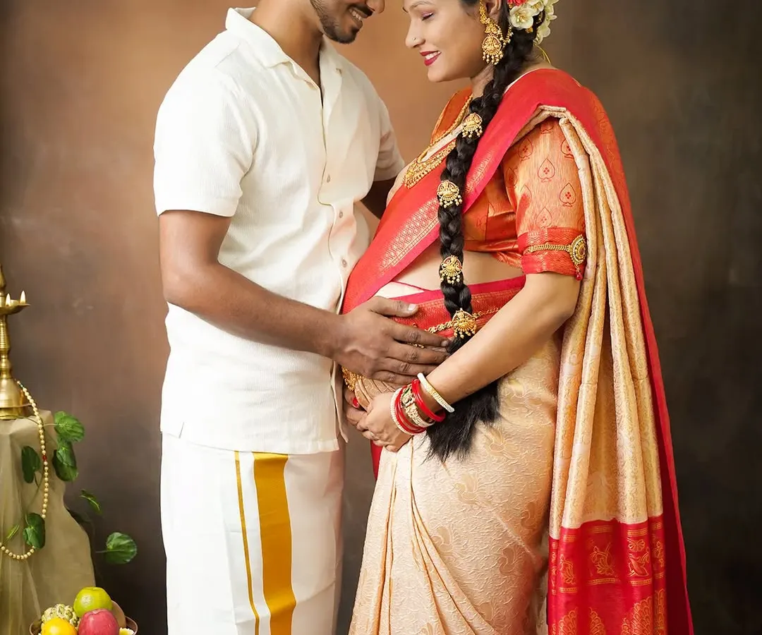 Celebrating heritage and new beginnings with a traditional South Indian style maternity shoot. We help you style these sessions with authentic attire and props to honor your family's culture.