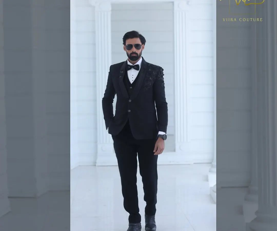For the groom who appreciates classic style. This sharp black tuxedo is a timeless choice for a reception or cocktail event. It's a perfect example of the premium groom's wear you can find in my collection, available for sale at an amazing price.