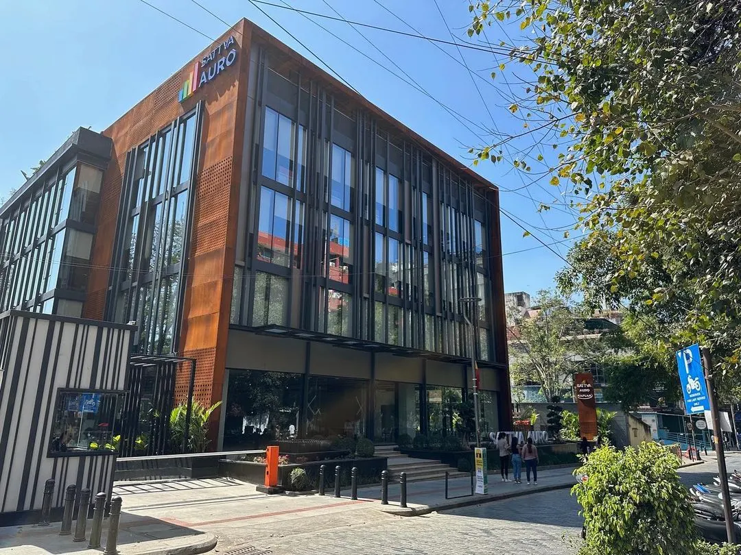 We designed this contemporary commercial building on Church Street, Bangalore, using a bold Corten steel and glass facade to create a landmark property for retail and workspace environments.