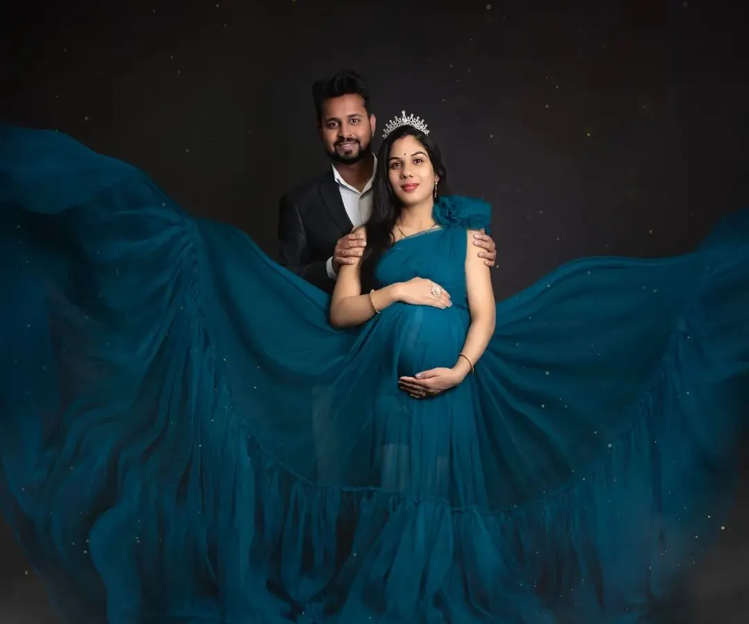 Every mother-to-be is a queen, and this is her magical moment. In the studio, we can create these beautiful, flowing gown portraits that feel like they are straight out of a fairytale. It’s a celebration of the incredible journey of creating life.