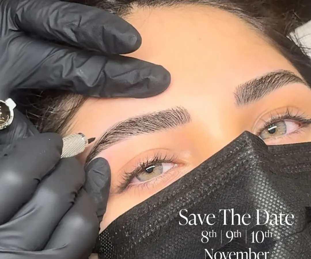 A close-up view of the microblading process in action. Our expert artist uses a precision tool to create fine, hair-like strokes, demonstrating the meticulous detail that goes into crafting each custom brow shape.