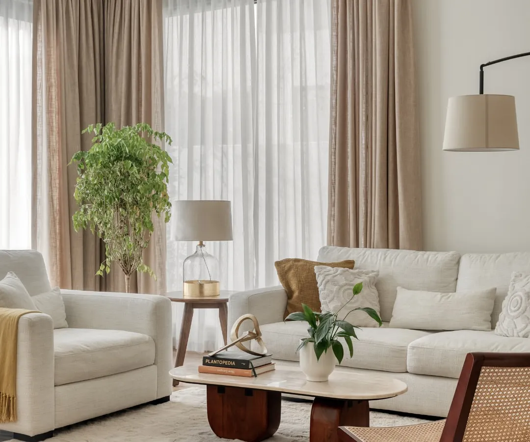 For our first villa project in Dubai, we created a light and airy living space perfect for a young family. The design uses a breathable palette of soft textiles, natural woods, and cane to create an expansive feel that is both functional and calming in the Dubai heat.