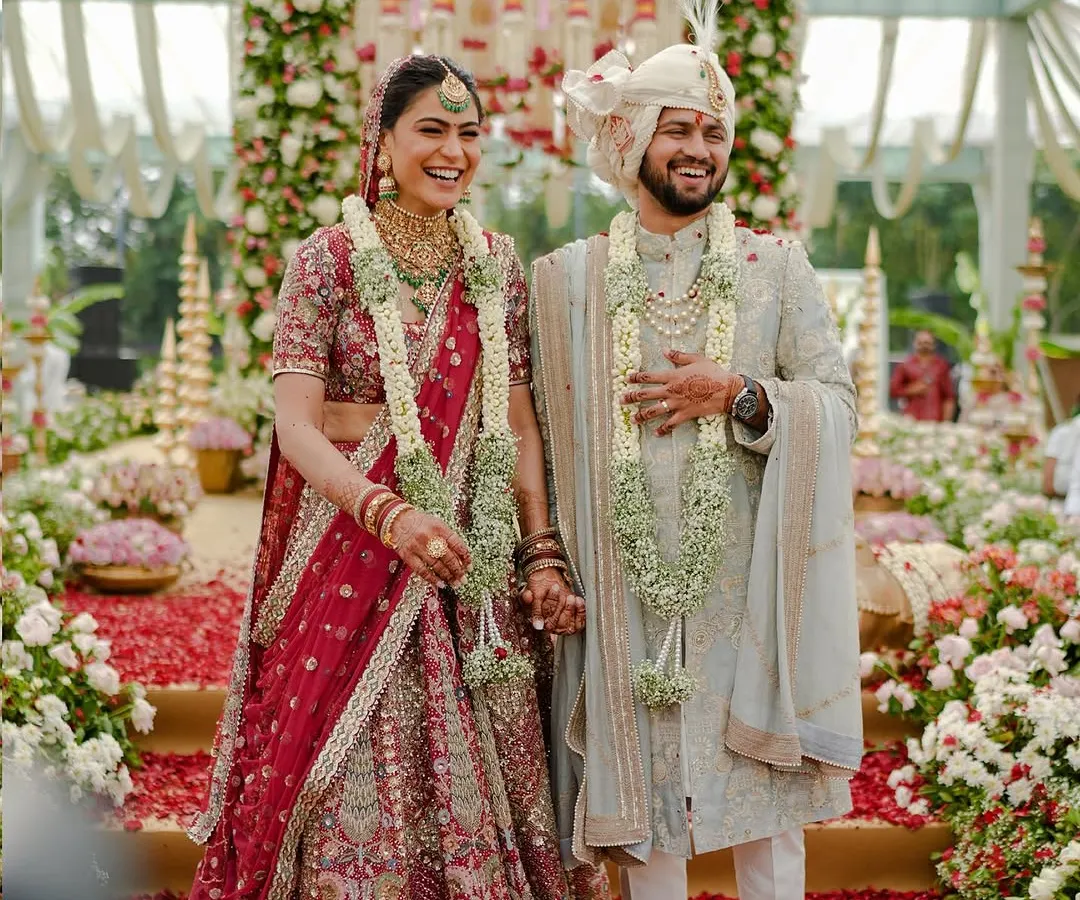 This is the moment it all becomes real. The pure, unscripted joy of a couple surrounded by love and a shower of petals under a mandap we designed just for them. These are the memories I live to create.