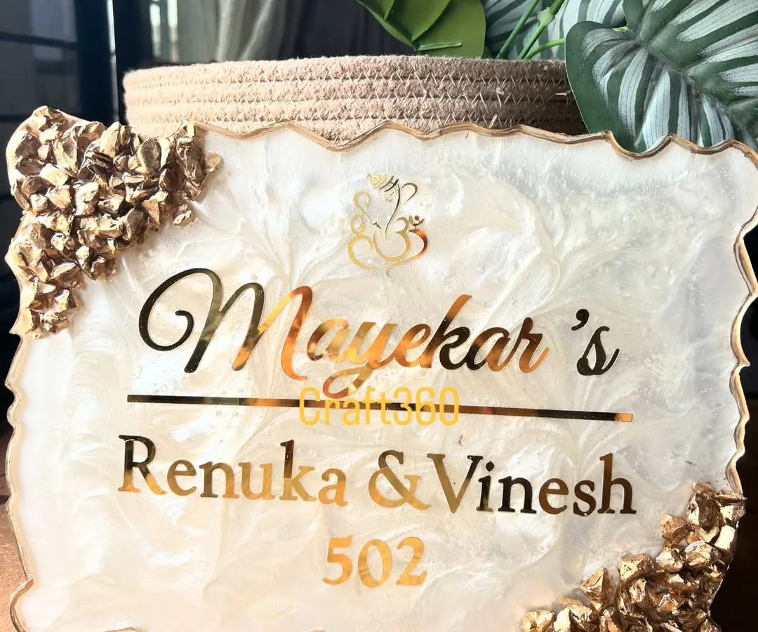 A classic and elegant nameplate design that is one of my most requested styles. I created this piece with a white and gold marble effect, accented with geode crystals, to give the entrance a feeling of warmth and luxury.