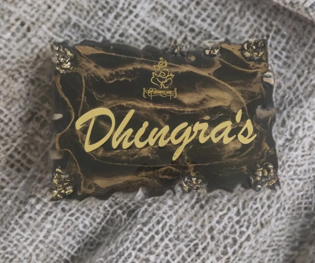 Your nameplate is the first thing guests see, so let's make it special. I designed this one for the Dhingra family with a classic black and gold marble resin pour and a little Ganesh ji for blessings.