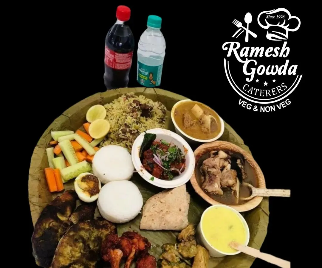 A complete non-veg oota served on a traditional banana leaf. This spread includes our signature mutton biryani, chicken fry, fish tava fry, mutton chops, and more, showing the variety we offer for a proper baadoota.