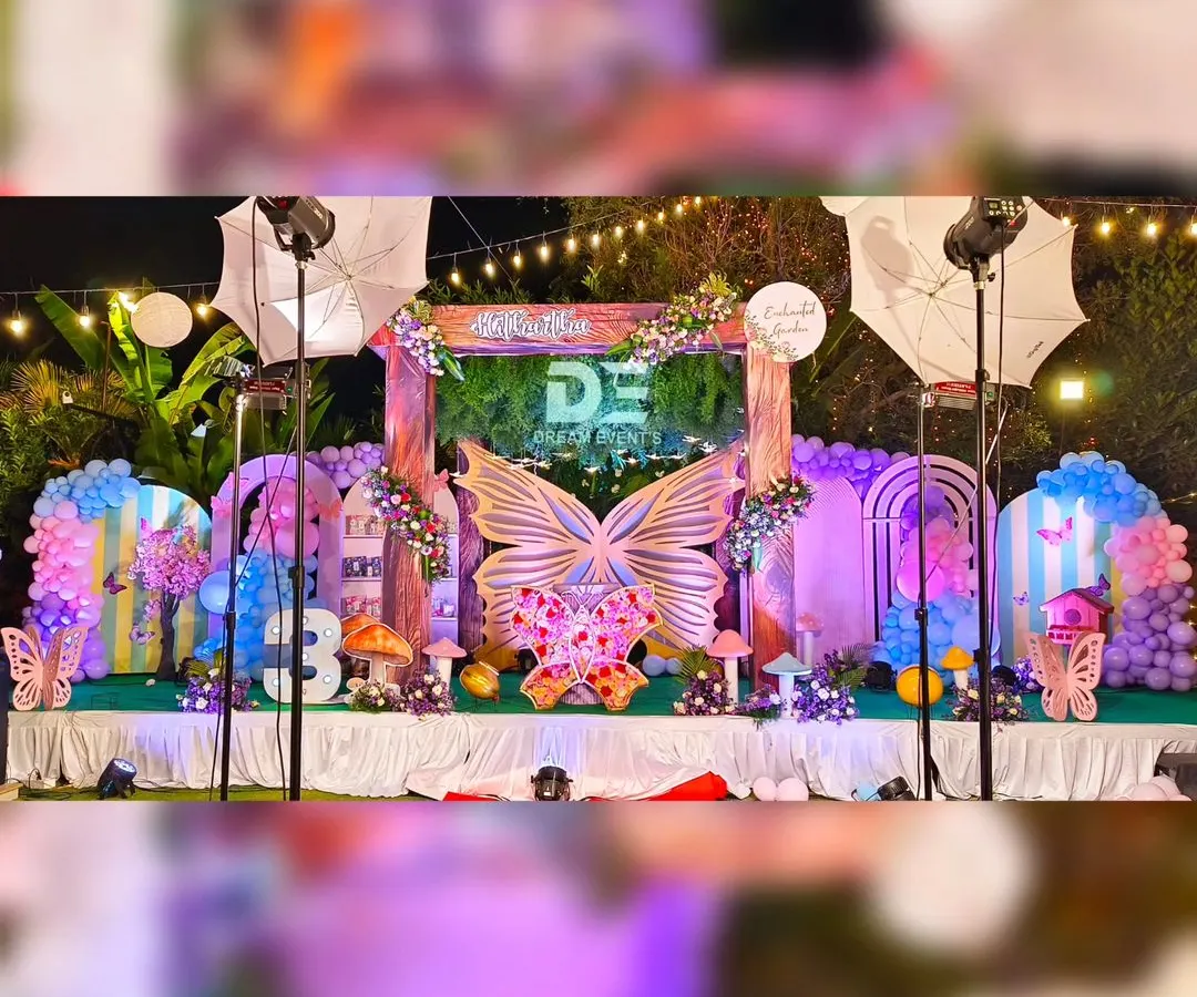 I specialize in creating immersive worlds for children's birthdays. This 'Enchanted Garden' butterfly theme features a grand stage with custom props, professional lighting, and intricate balloon arrangements to make any child's dream party a reality.