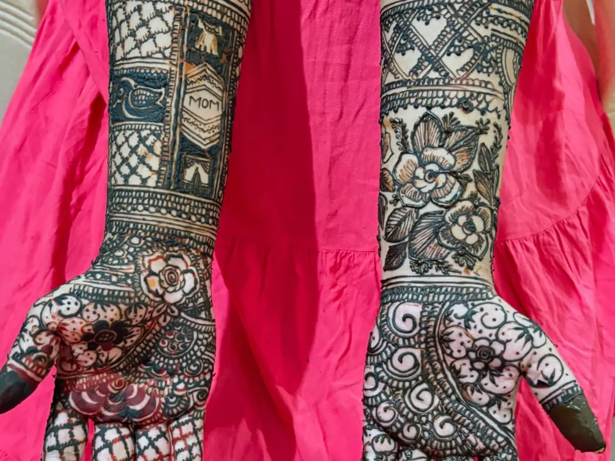 I love making your mehendi personal. This custom design was for a beautiful mom-to-be, with "Baby Shower" written across her arms. We can incorporate any name, date, or special message into your henna.