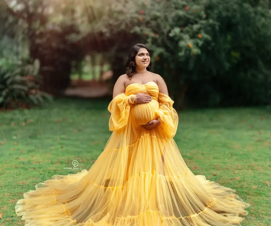 Bathed in the warm glow of the golden hour, this outdoor maternity photo captures pure joy. I love using natural light in parks and gardens around Bangalore to create these radiant pregnancy portraits.
