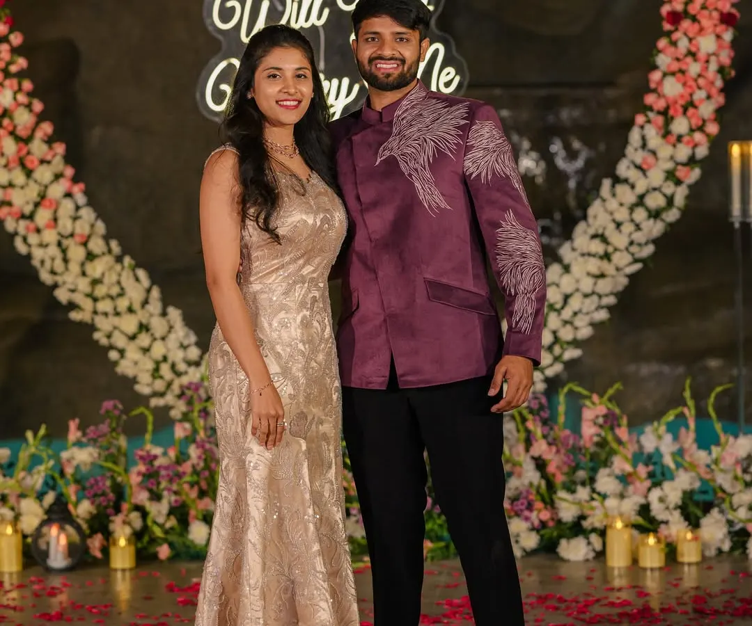 This look is perfect for a modern engagement or pre-wedding event. I created this custom deep purple bandhgala jacket with striking silver embroidery on the shoulder and sleeve, offering a contemporary yet regal style.