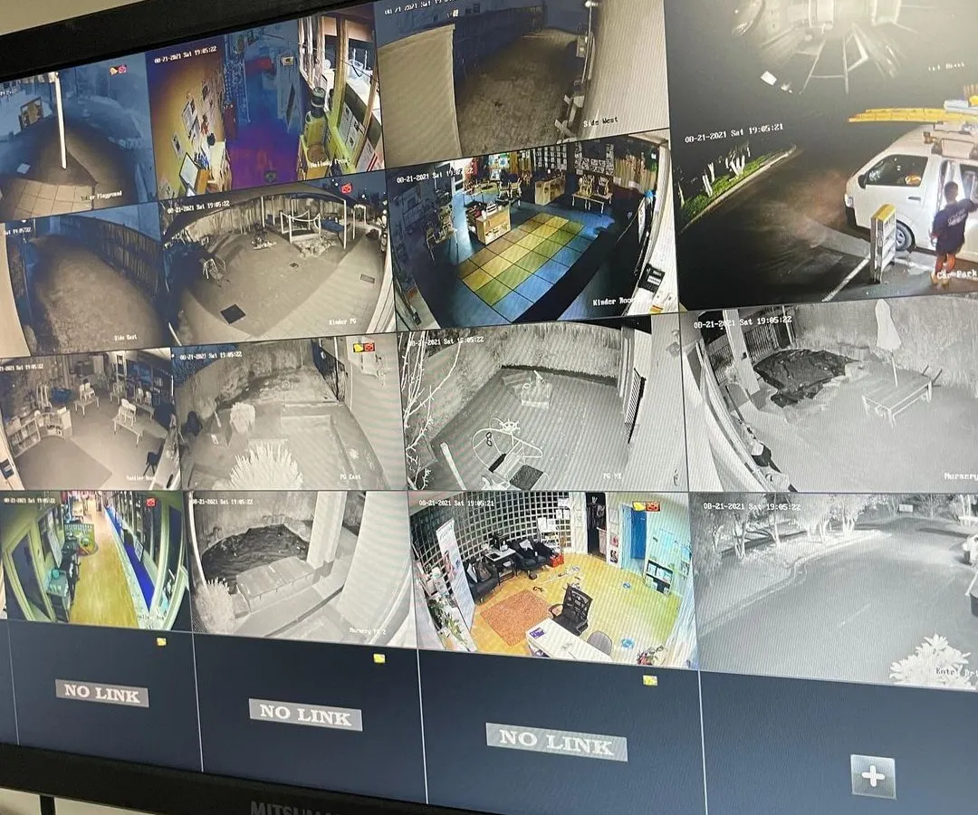 This is the view from a central monitoring station we set up for a client. We ensure you can see all critical areas of your business on a single screen, with clear night vision feeds for 24/7 security.