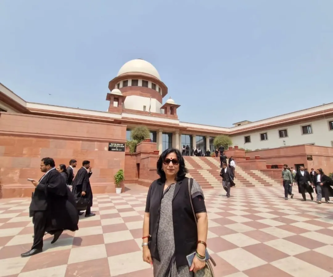 A moment of reflection outside the Supreme Court of India. I was here for a Public Interest Litigation to make workplaces safer for women by strengthening Internal Complaints Committees. The fight for justice often leads to the highest court in the land, and I am prepared to go the distance for my clients and causes.