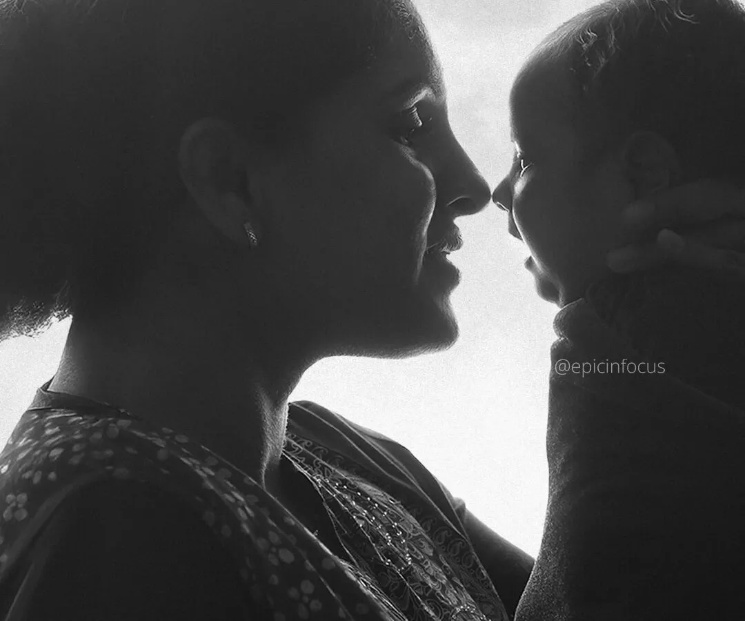 This black and white silhouette captures the timeless, tender connection between a mother and her baby. These artistic portraits focus on emotion and the powerful bond you share, creating a truly classic keepsake.