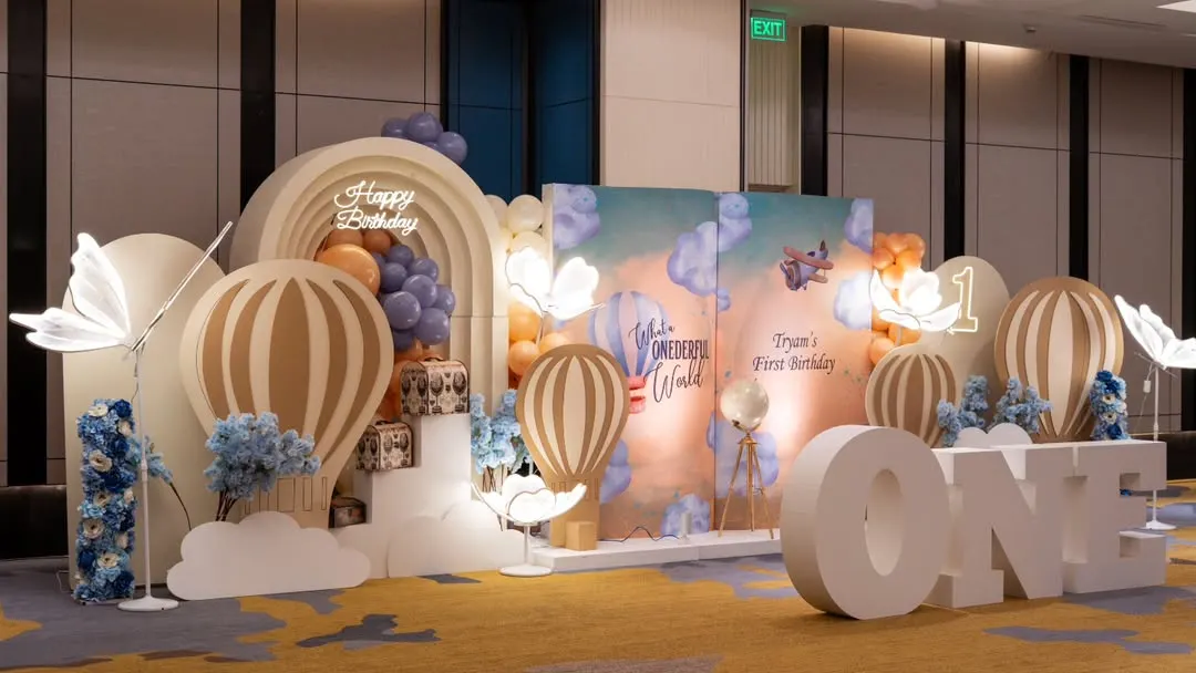If you can dream it, I can build it. This "Wonderful World" hot air balloon theme for a first birthday is a testament to my belief that events are art. The grand scale, custom props, and ethereal lighting come together to create a truly immersive world for your celebration.