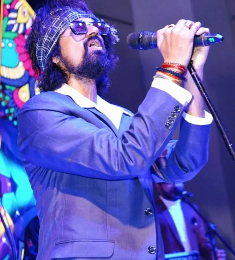 Lost in the music. This is me in my element, feeling every note during a live sufi rock performance. This is the passion I bring to every show, whether it's a large concert or an intimate wedding gig.